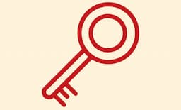 Röd ikon av en nyckel på gul bakgrund.