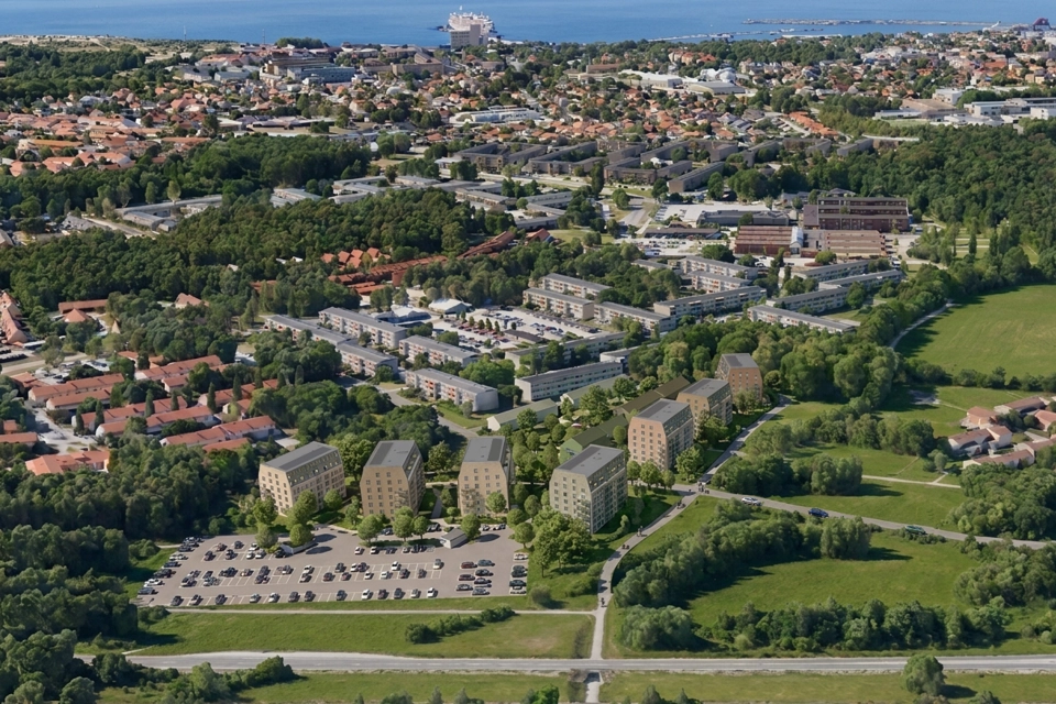 En flygbild över en stad med många träd.