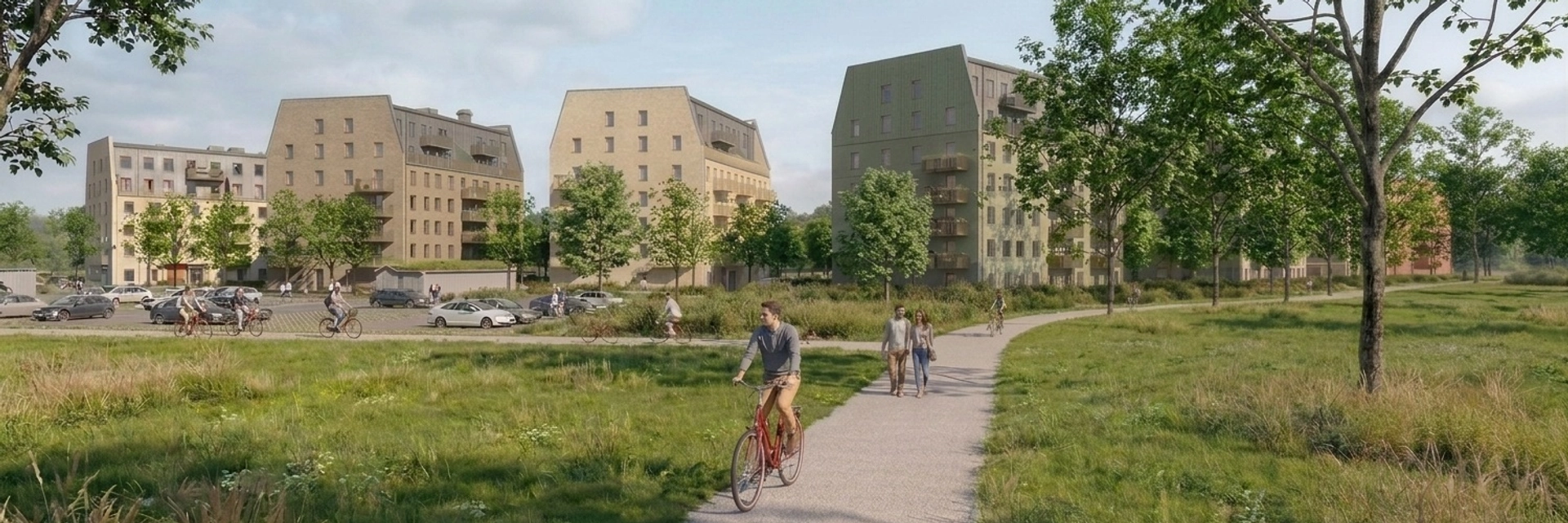 Några personer som cyklar på trottoaren.